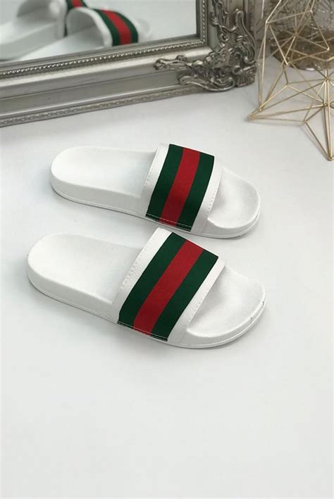 scarpe gucci uomo ciappette|Ciabatte da mare e slides da uomo di Gucci .